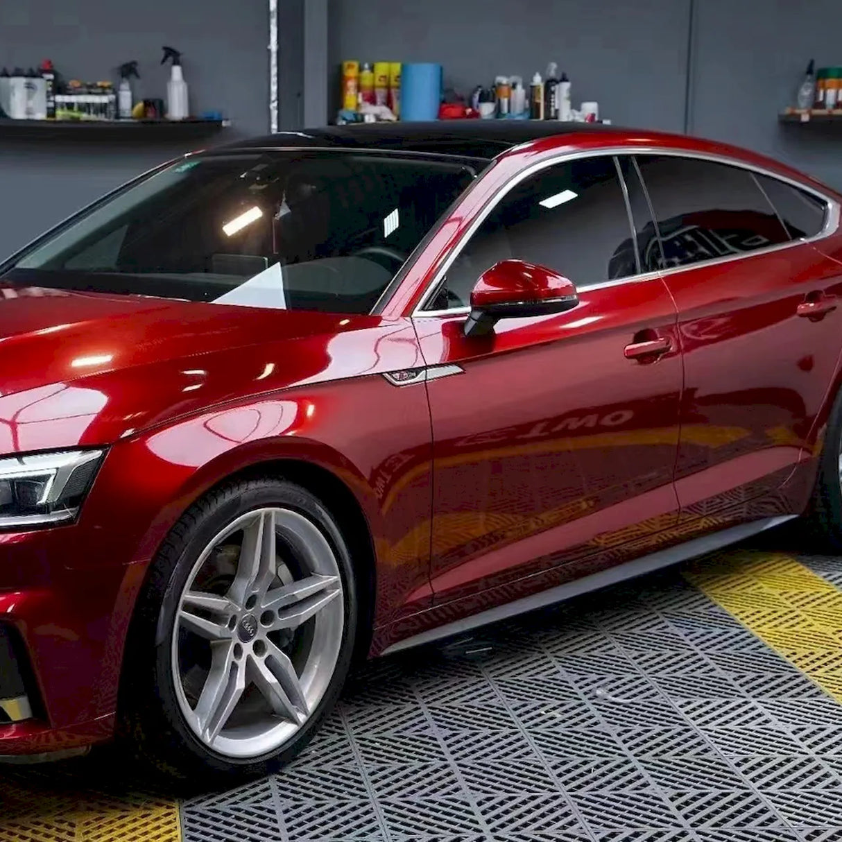 metallic cherry red car wrap installation