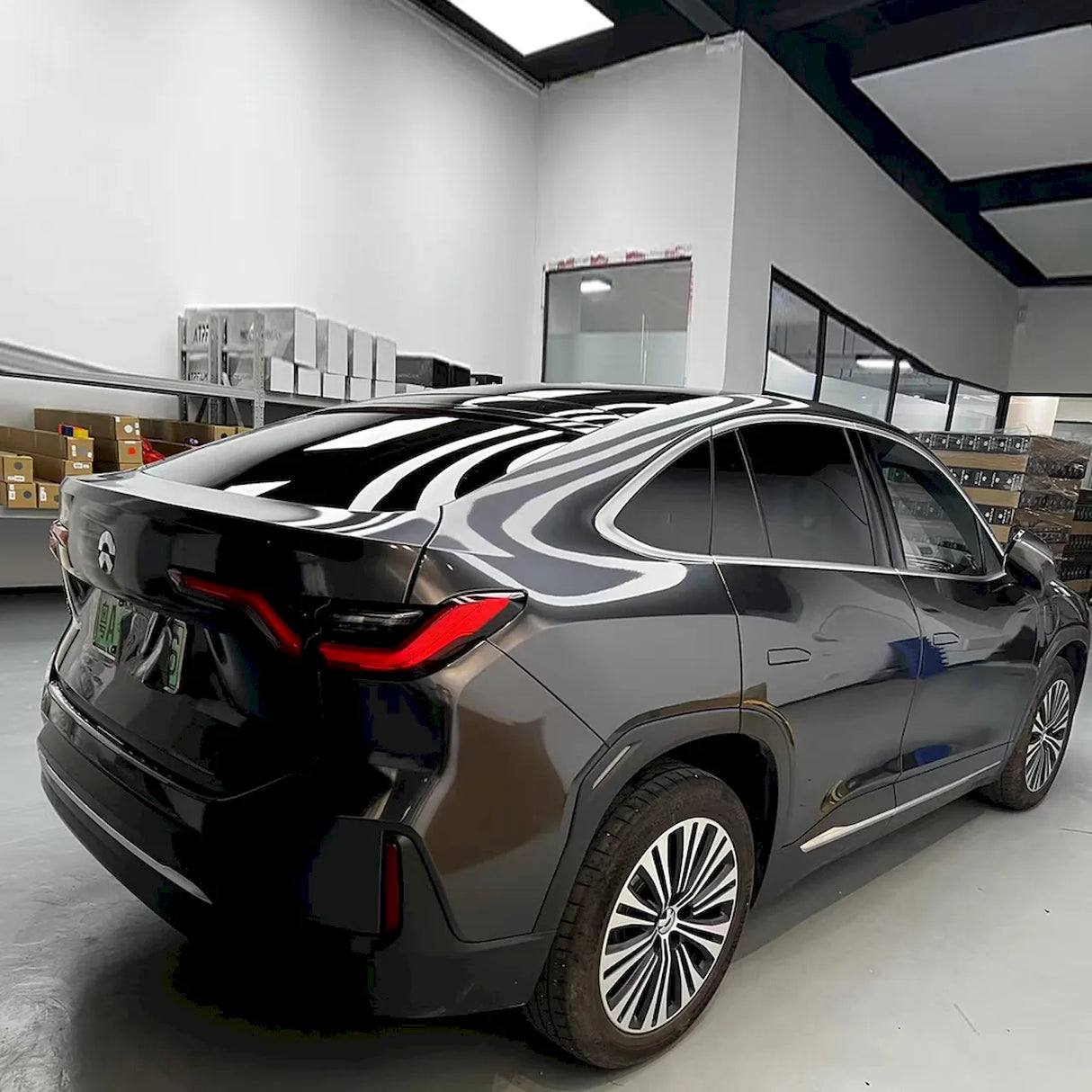 car wrapped in metallic coal gray vinyl wrap