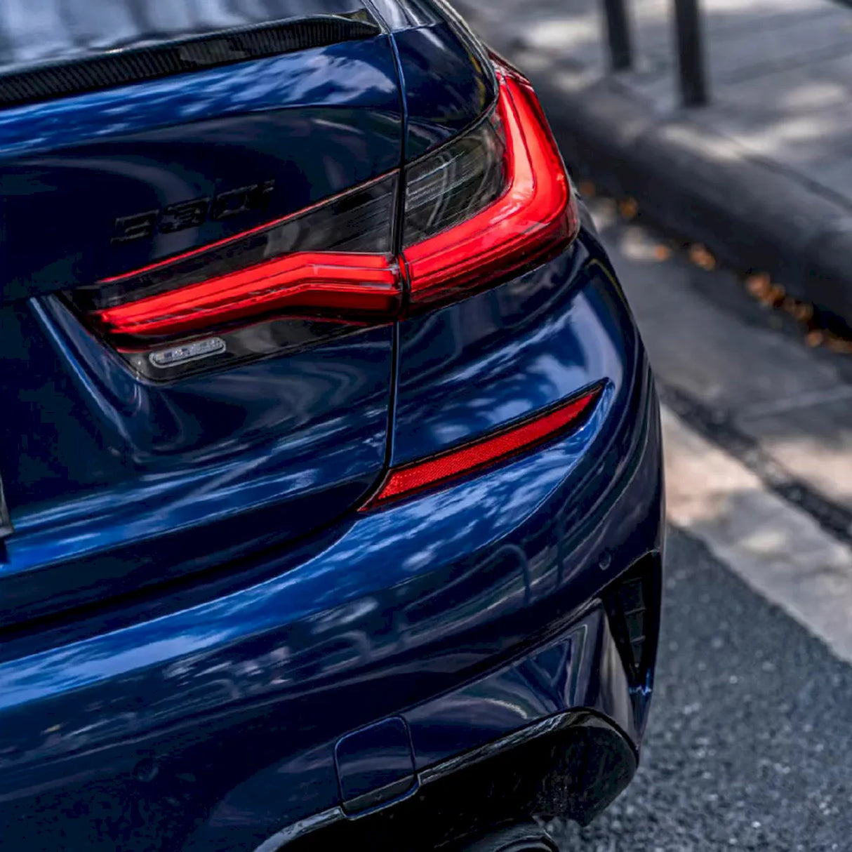 metallic deep blue car wrap view from up close