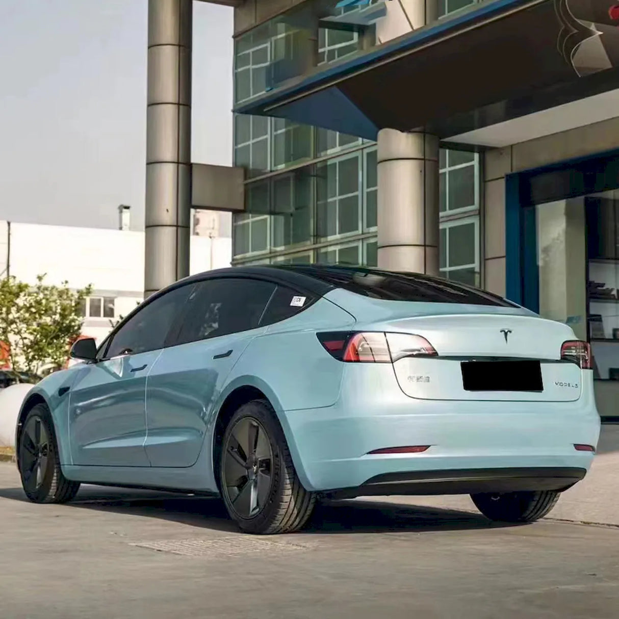 metallic ice blue wrap on a car