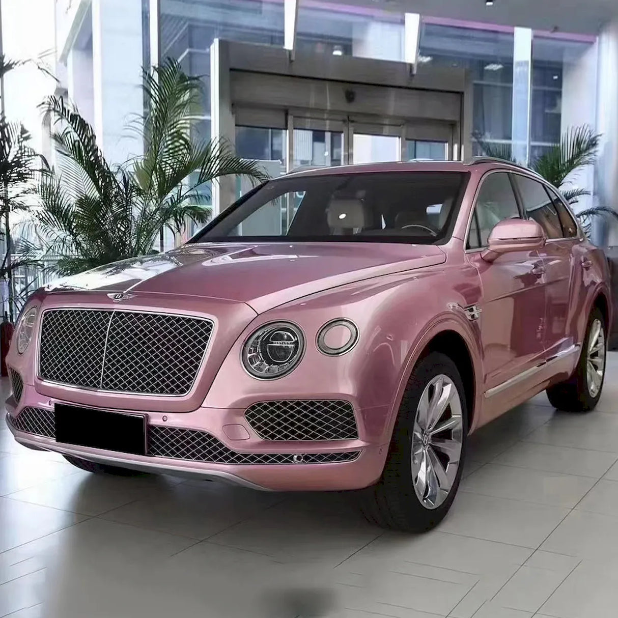 suv wrapped in metallic passion pink car wrap