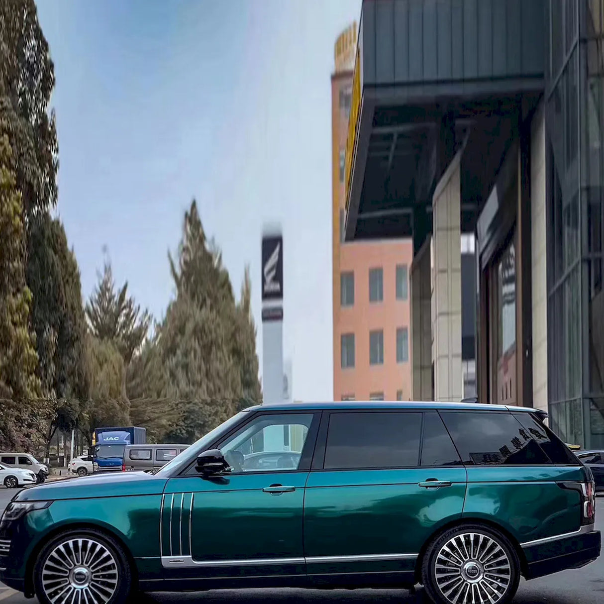 metallic royal green car wrap installed on a suv