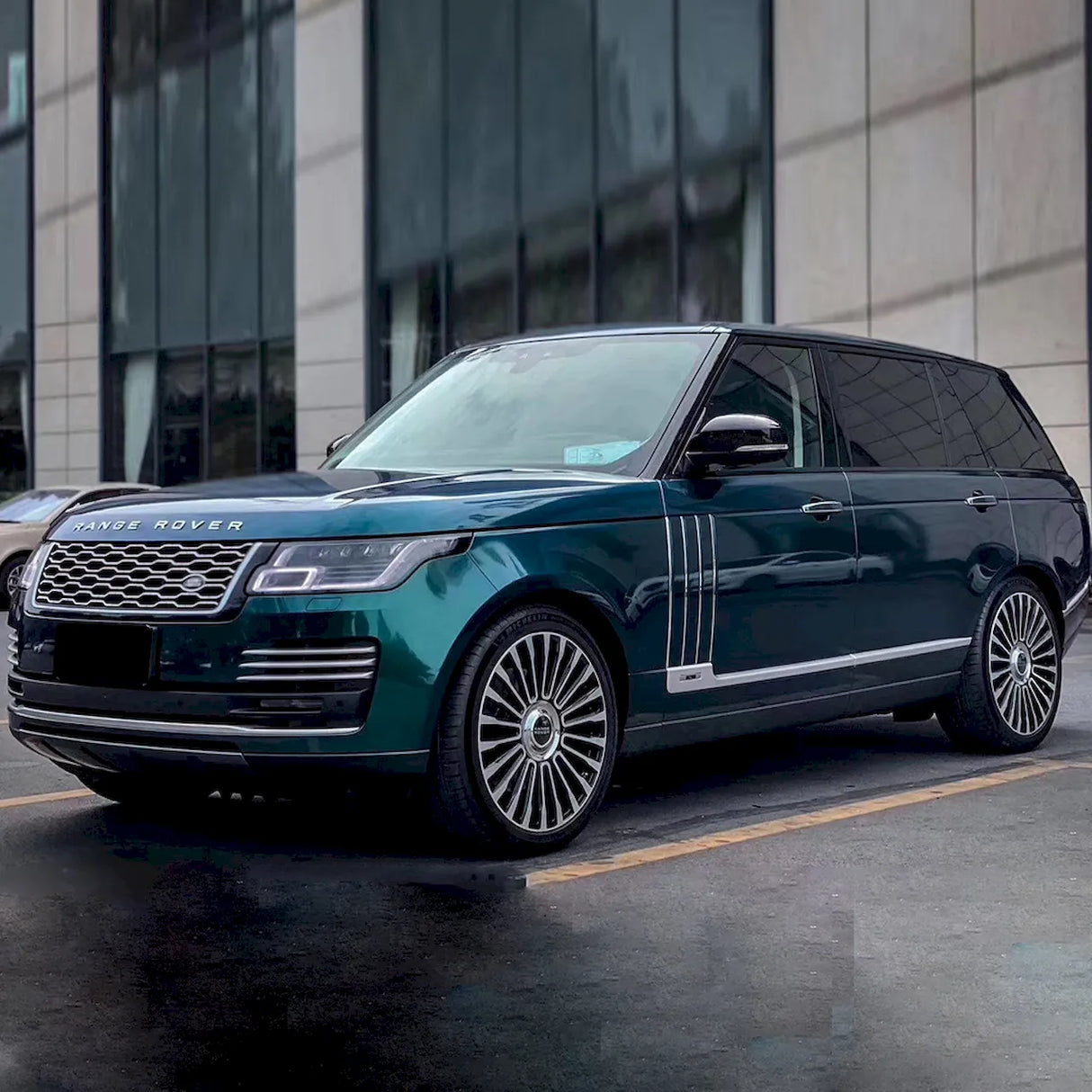 suv wrapped in metallic royal green car vinyl wrap