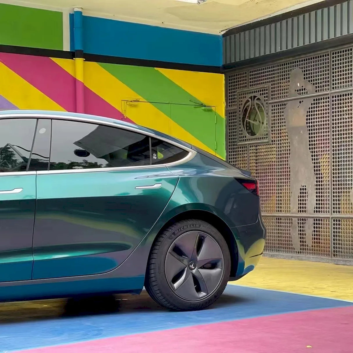 car wrapped in gloss finish metallic royal green car vinyl wrap