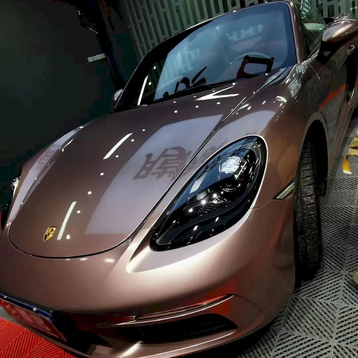 porsche wrapped in metallic strawberry pink vinyl wrap