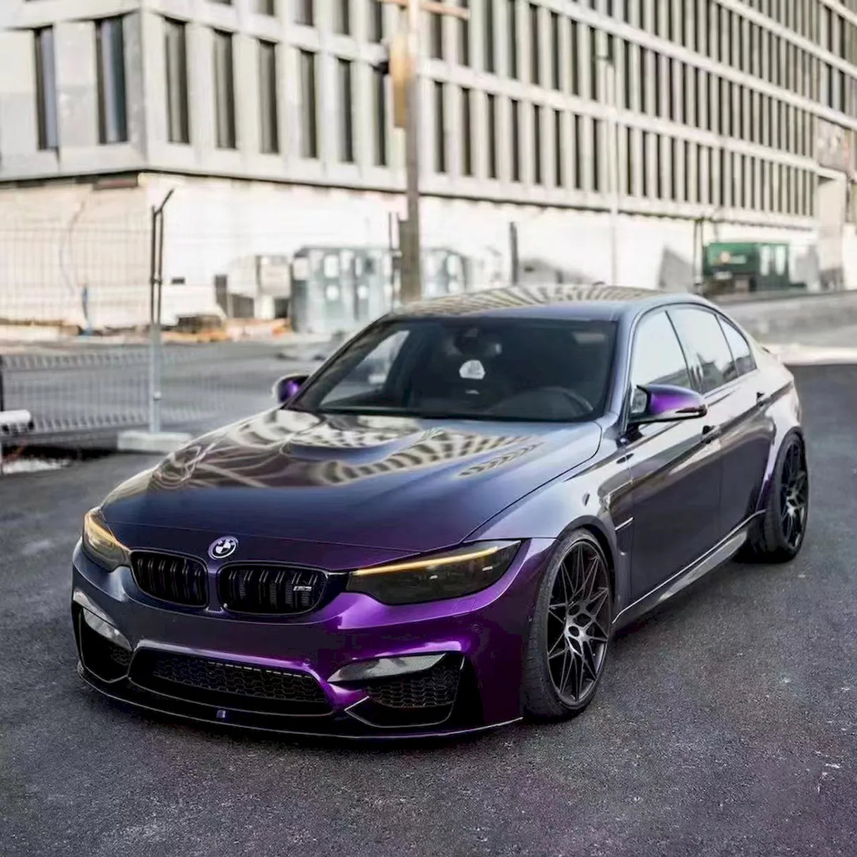 metallic venice purple car wrap installed on a bmw