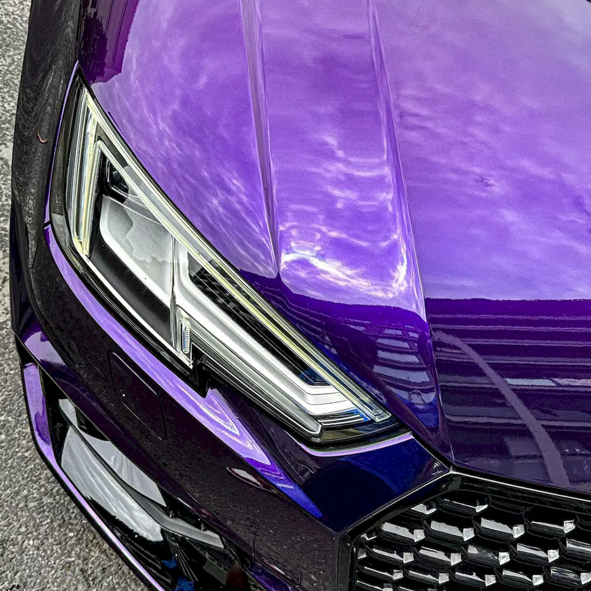 metallic venice purple car wrap installed on a vehicle