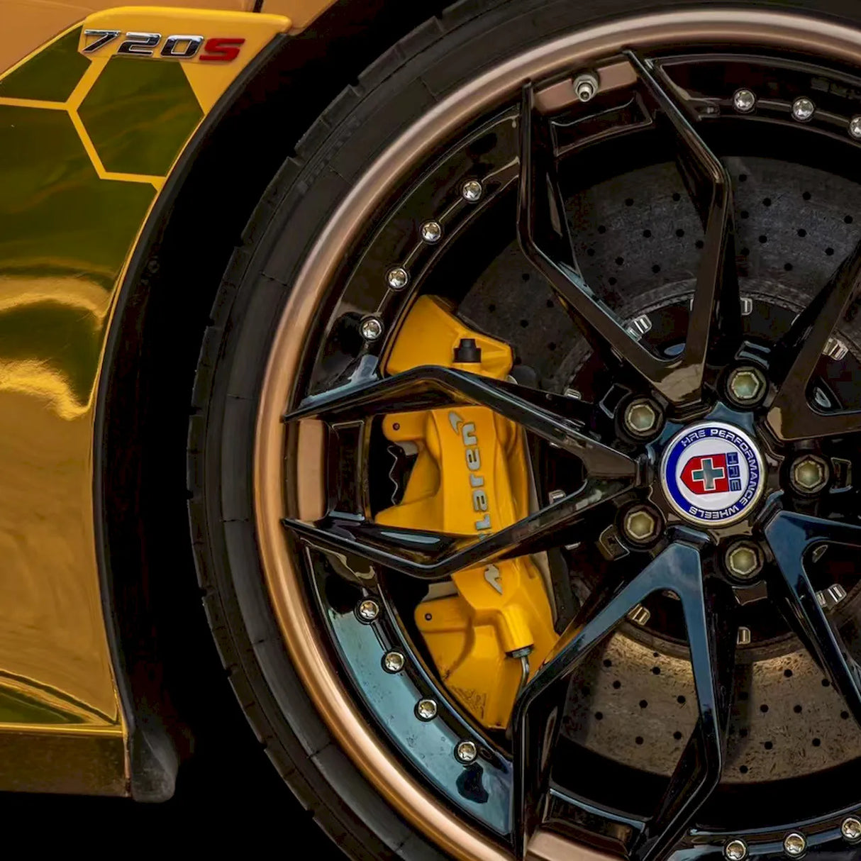 close up of paint yellow car wrap on a vehicle