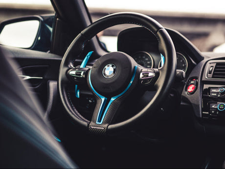 bmw steering wheel trim painted to color match by autotecknic