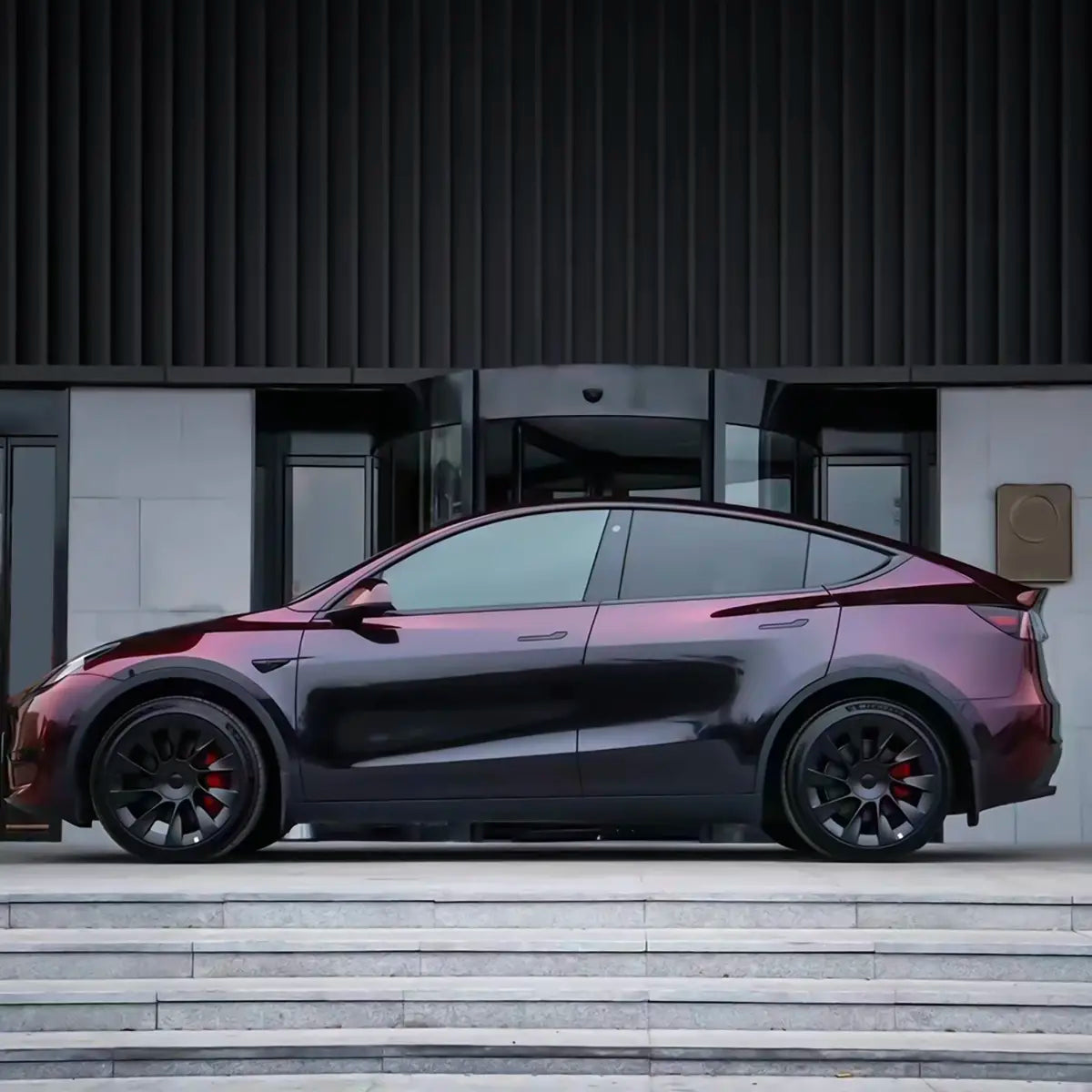 phantom red car wrap on a tesla