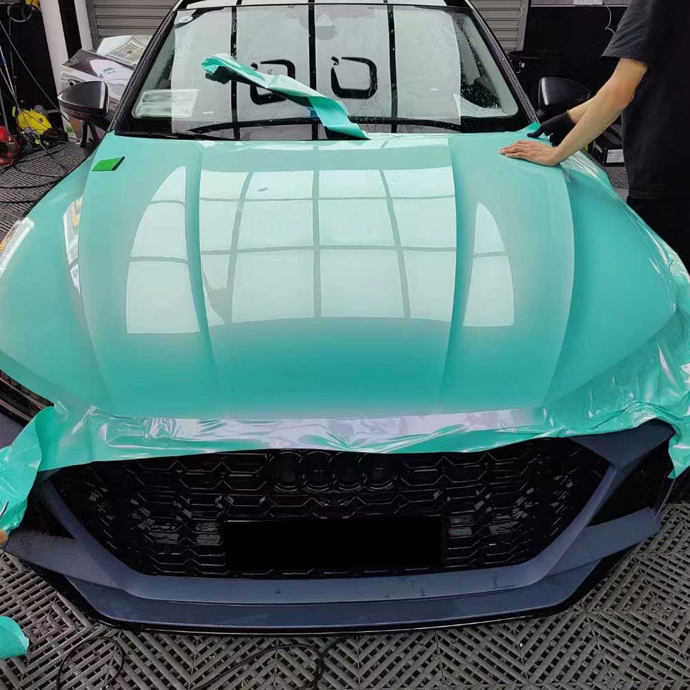 racing aqua green blue car wrap installation