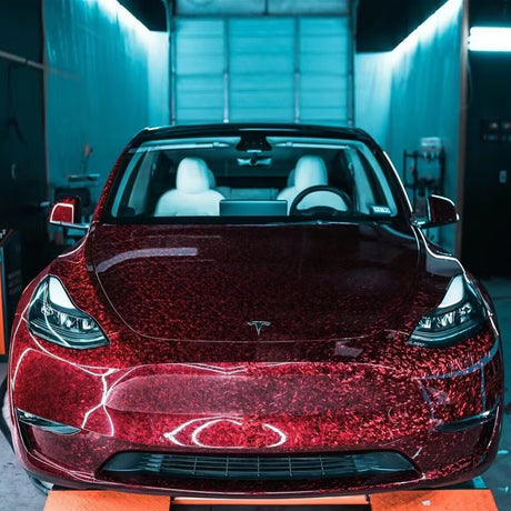 car wrapped in red forged carbon vinyl wrap