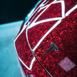 red forged carbon car wrap on a tesla hood