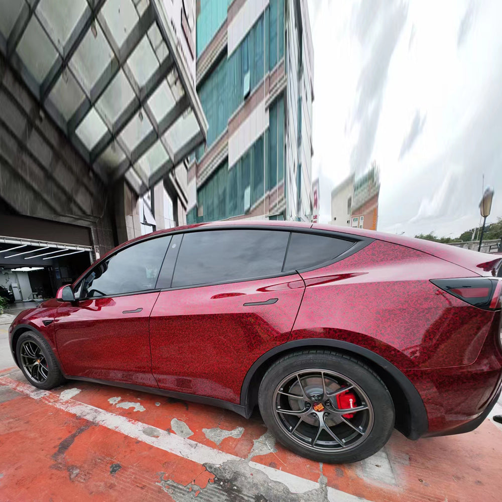 red forged carbon car wrap on a car