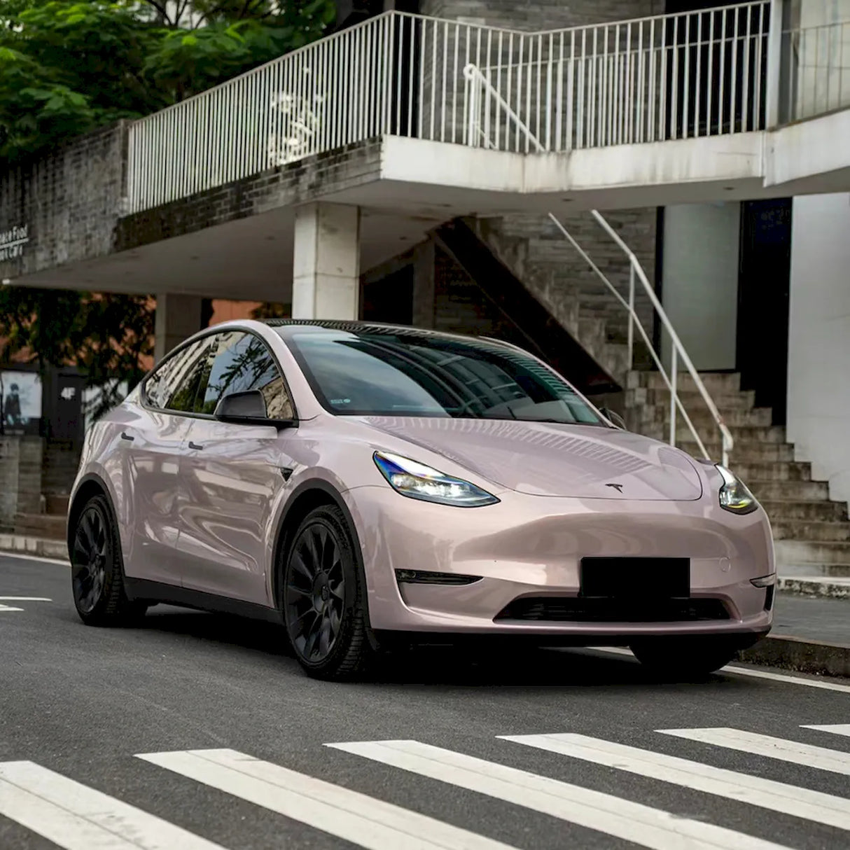 sports car wrapped in rouge pearl pink wrap