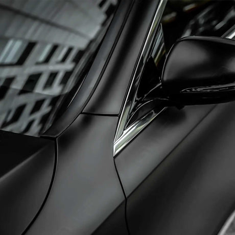 satin black vehicle wrap shown up close