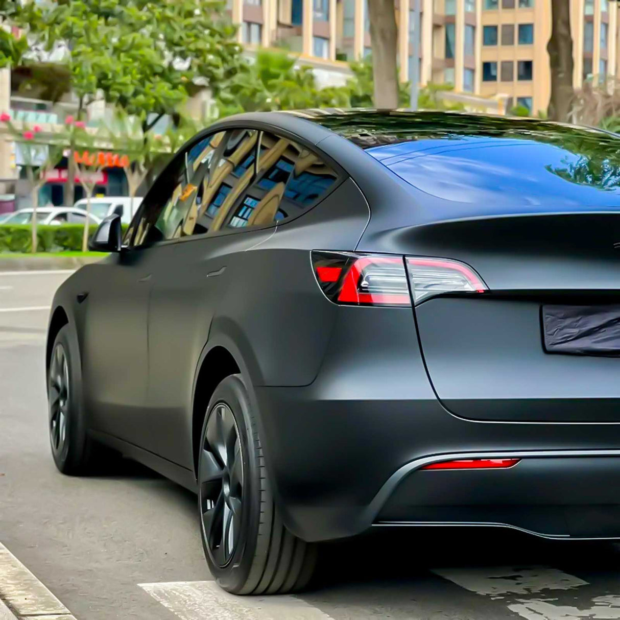 satin black vehicle wrap shown on a tesla model Y
