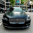 lincoln wrapped in satin black vehicle wrap