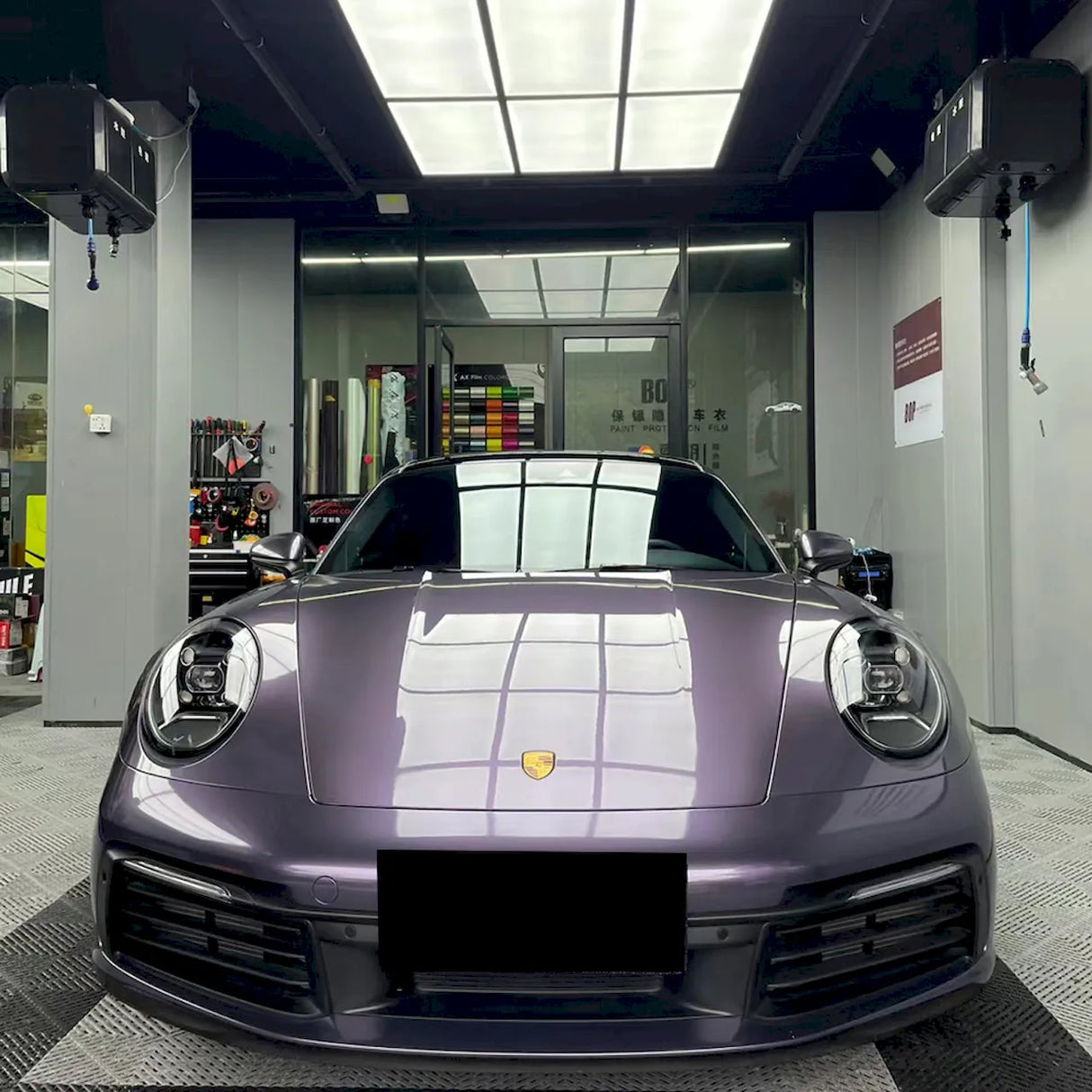 car being wrapped in purple violet gray car wrap