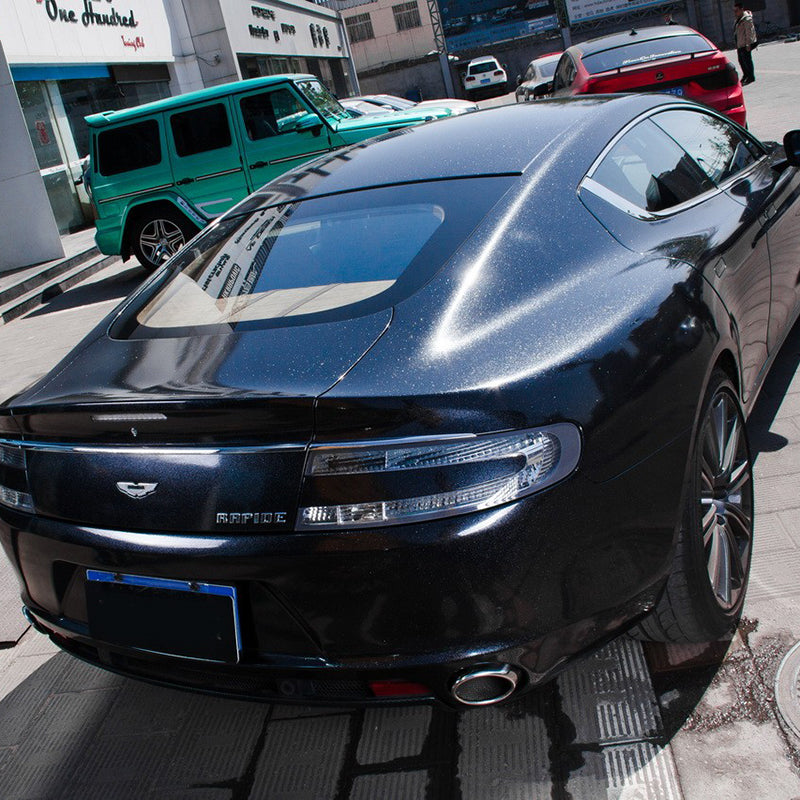 sparkling black car wrap in the sun