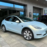 side view of a car wrapped in ultra matte gold blue color changing car wrap