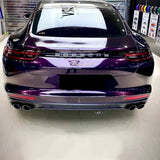 amethyst purple car wrap being installed on a vehicle