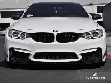 a set of dry carbon fiber canards being shown on bmw f82 m4