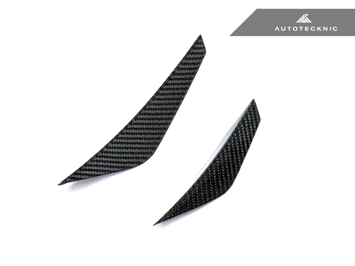 close up shot of dry carbon fiber canard set by autotecknic for g8x bmw