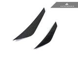 close up shot of dry carbon fiber canard set by autotecknic for g8x bmw
