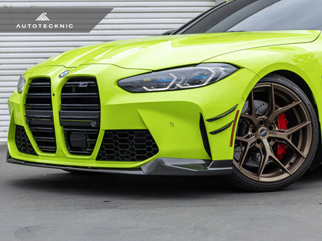 dry carbon fiber canard set by autotecknic on a g82 bmw m4