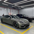 gloss metallic aventurine green car wrap on a sports car