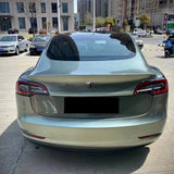 car wrapped in gloss metallic aventurine green vinyl wrap