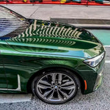 blackish green gloss car wrap installed on a vehicle