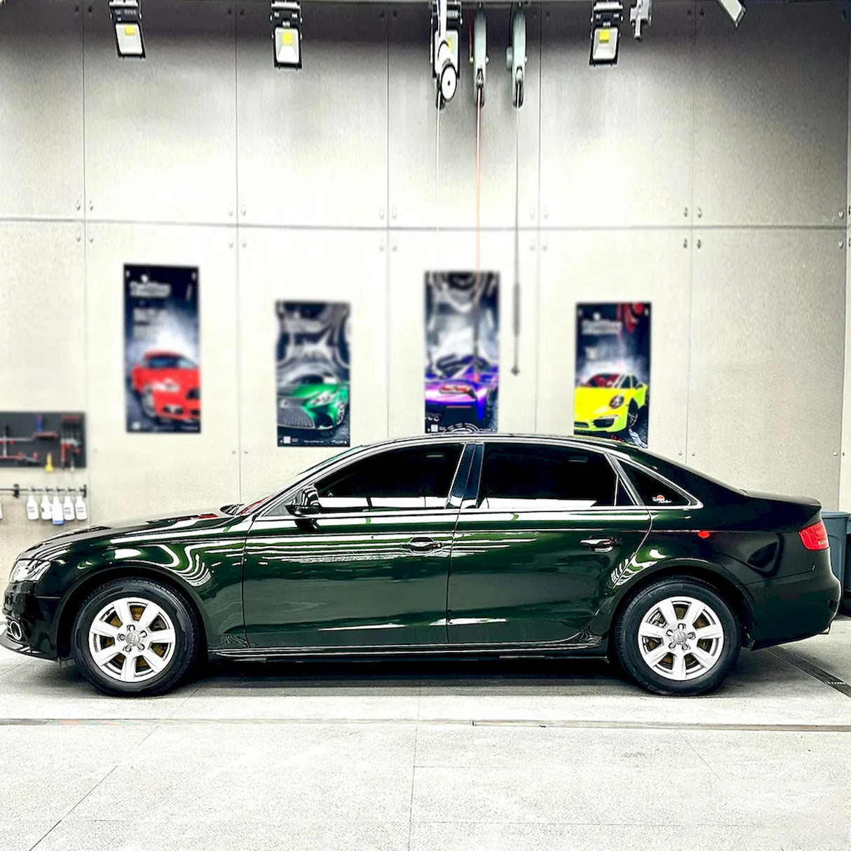 car wrapped in blackish green car vinyl wrap