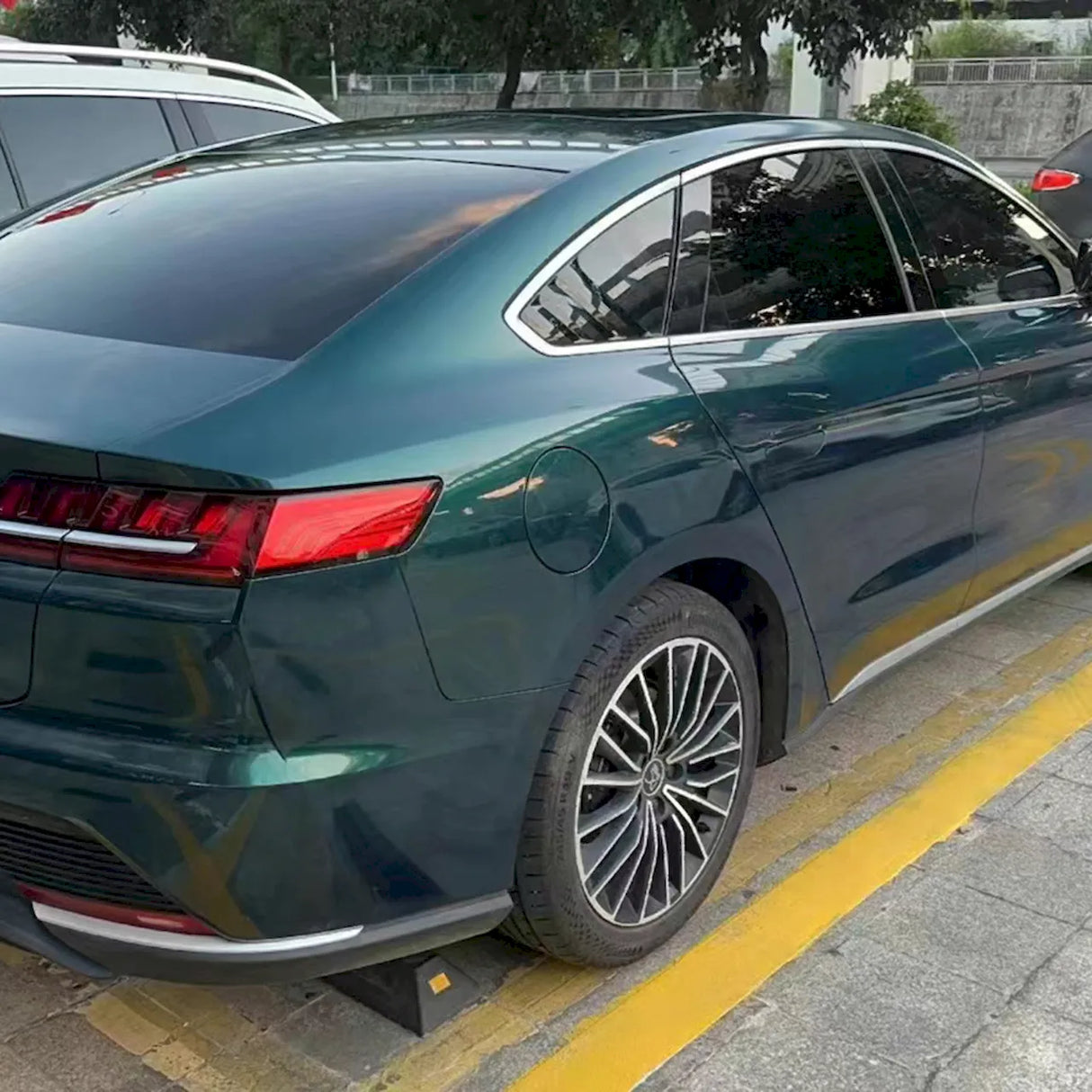 car wrapped in ceramic jade green car wrap