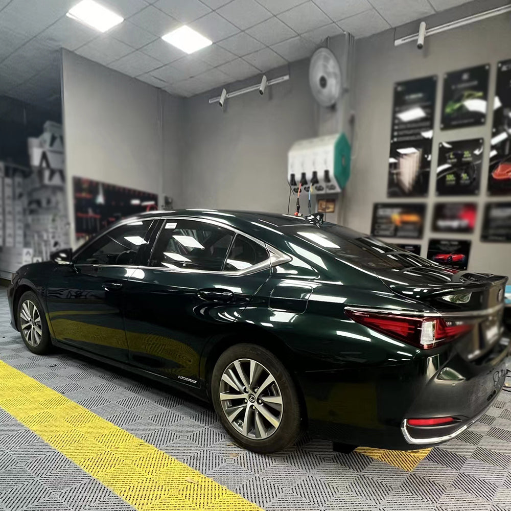 car wrapped in dark emerald green gloss car wrap