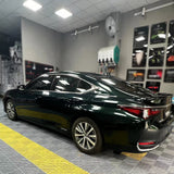 car wrapped in dark emerald green gloss car wrap