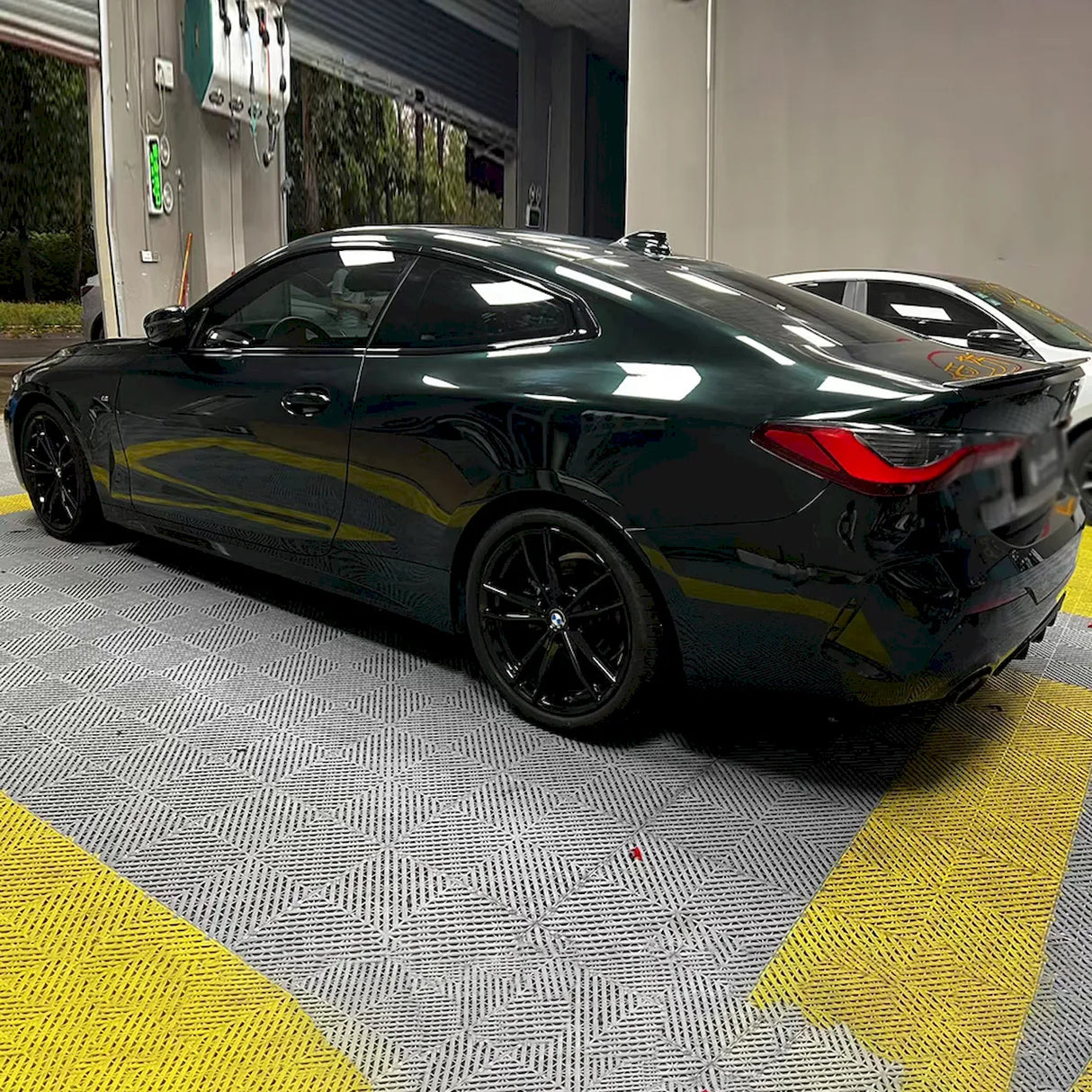 sports car wrapped in dark emerald green car wrap