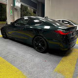 sports car wrapped in dark emerald green car wrap