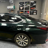 emerald green car wrap vinyl installed on a sedan