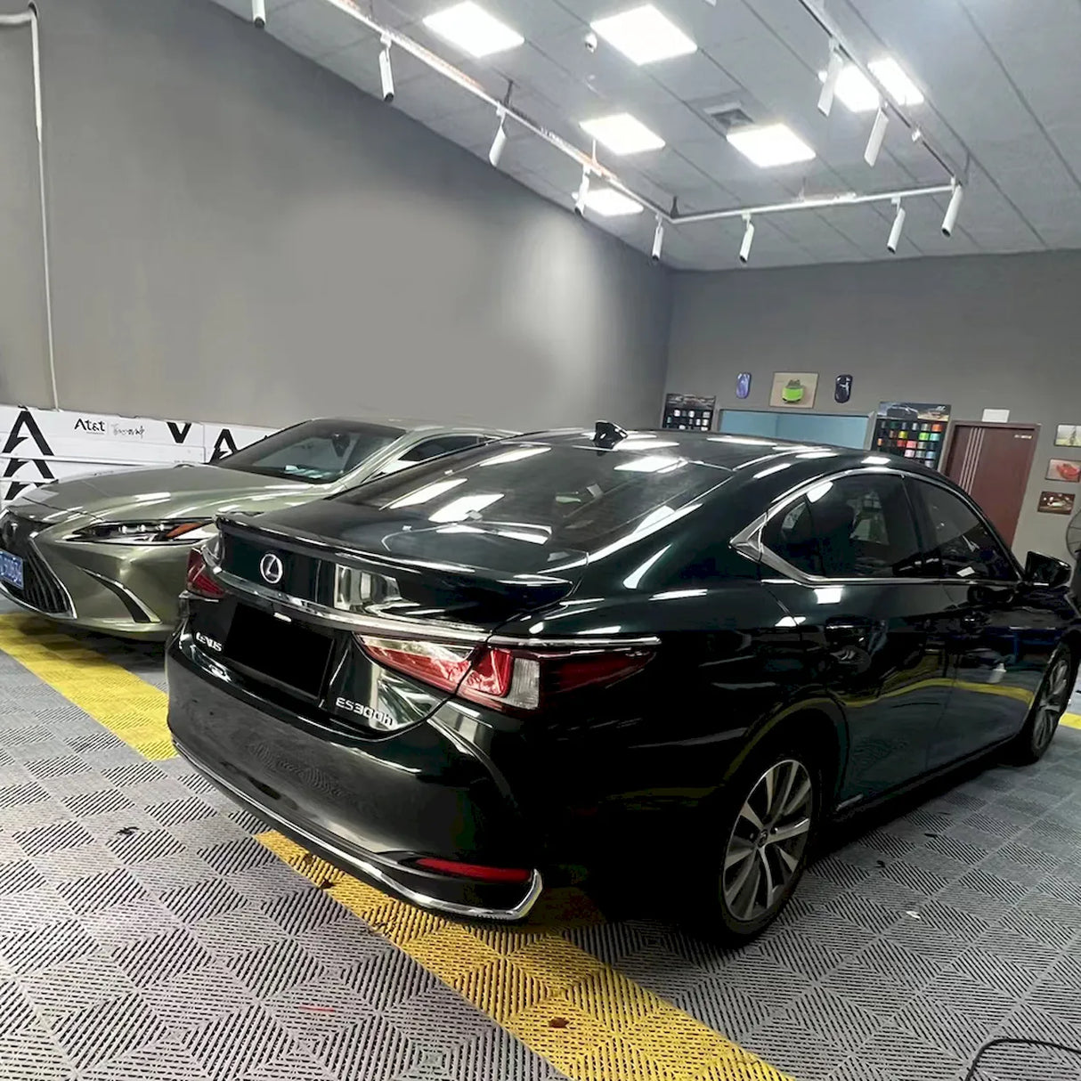 emerald green car wrap installed on a sedan