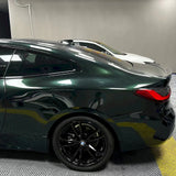 dark emerald green car wrap installed on a bmw