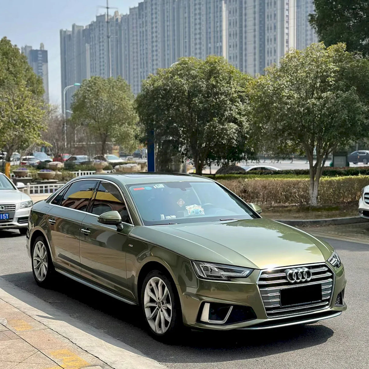 dazzling night green car vinyl wrap in the sun