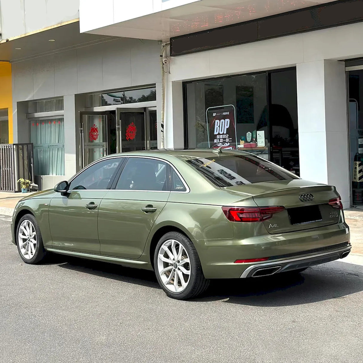 dazzling night green car wrap in the sun