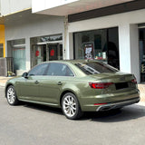dazzling night green car wrap in the sun