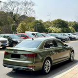 vehicle wrapped in gloss night green car wrap
