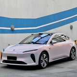 diamond pollen sparkling pink vehicle wrap installed on a car