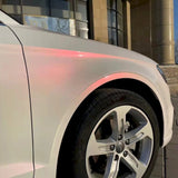 diamond pollen sparkling pink car wrap with gold flakes up close look in the sun
