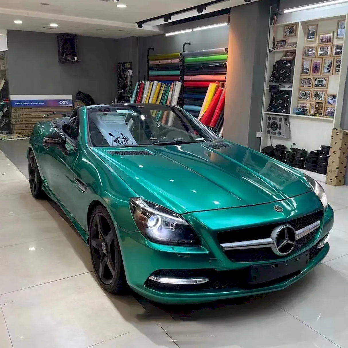 car wrapped in emerald green car wrap