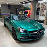 car wrapped in emerald green car wrap